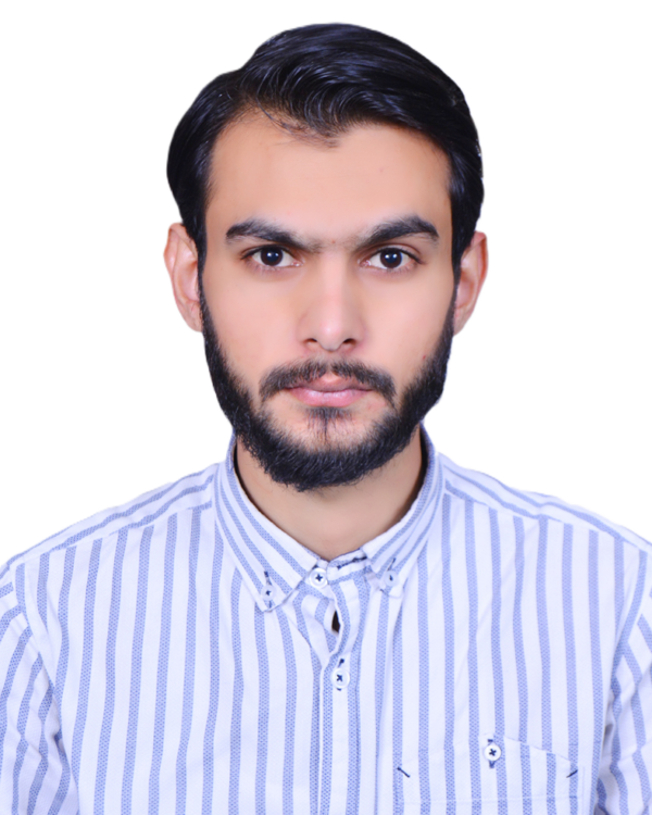 Portrait of a man with dark hair and beard, wearing a light blue striped button-down shirt, looking straight at the camera.